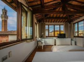 B&B Le Logge Luxury Rooms, πολυτελές ξενοδοχείο στη Σιένα