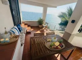 Elegante vista mare con posto auto privato