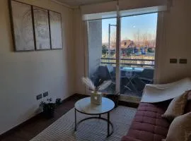 Depto. nuevo en condominio, estacionamiento y wifi