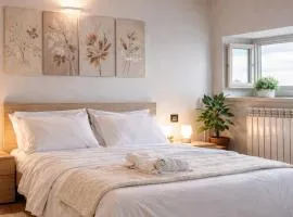 Elegante Appartamento Dolomiti Vista Montagna WiFi e Parcheggio