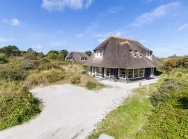 Luxe Duinvilla Stern met sauna voor 8 personen nabij strand en dorp Nes