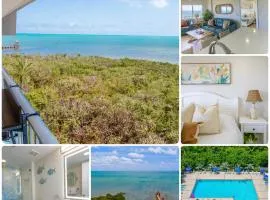 Top Floor w Ocean Views! Heated Pool & Marina!