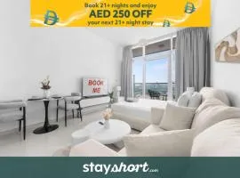 Free housekeeping visits during your stay - StayShort - Serene Studio in DAMAC Hills near Golf Course - Sleeps 2