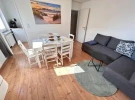 Vier Nordlichter - Große Ferienwohnung mit Dachterrasse 3 Schlafzimmer Bensersiel