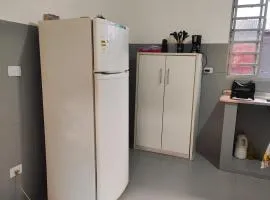 Quartos compartilhados com cozinha equipada