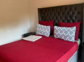 Zim Safari Guest Lodge, hotel di Harare