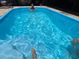 Casa com área de lazer em Xerém