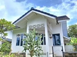 Palm cozy villa 1, Hotel in Pasauran