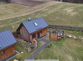 Siedlisko pod Wieżycą - klimatyczne drewniane domki , z banią na wyłączność, Wieżyca, Kaszuby, Hotel in Rąty