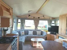 VJ Plum a 2 bed 6 berth luxury static caravan, bedding Included, on Coral Beach in Ingoldmells