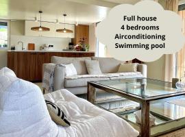 Viesnīca Maison avec piscine et climatisation aux portes de Lyon pilsētā Limonē