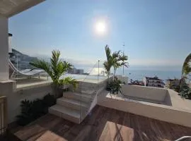 Departamento moderno con roof top en zona romantica 102