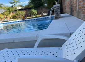 The Paml Suites, Hotel in Llano de Los Patos