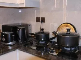 Designer Den three Bed apartment with giga veiw