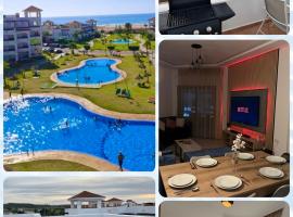 Beachfront Apartment in Assilah, Private Solarium, 4 Pools, Secure Residence, WiFi, Parking, hotel sa Asilah