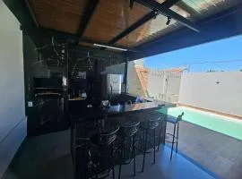 Baza um lugar perfeito para descansar, piscina aquecida, ar condicionado, garagem coberta e etc