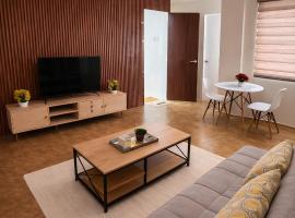 Modern Cozy Home Near The Farm at San Benito โรงแรมในMuntingpulo
