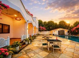 Amber Villa, hotel u gradu Nāi