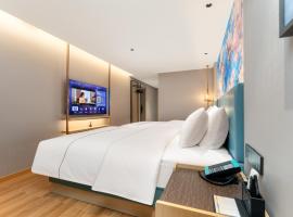 白玉兰商务酒店恩施火车站机场店, hotel 