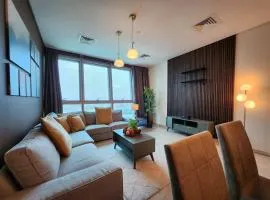 Luxury 4BR Lounge, Sea&Pearl View, Above Mall