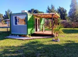 Mini casa entre el bosque y el mar