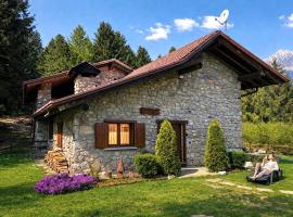 Baita immersa nella natura: Borno'da bir otel