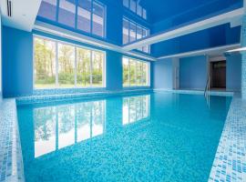 Błękitna Fala Resort, hotel v destinaci Dąbki