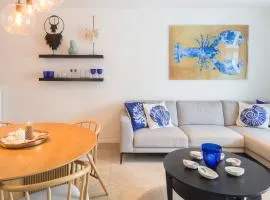 Modern coastal apartment with terrace & pool acces