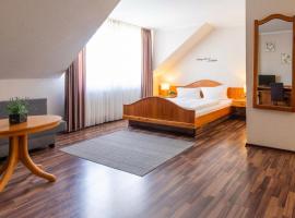 Sali - Hotel zum Dorfbrunnen, hotell i Bornheim