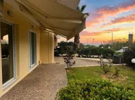 Glyfada Garden Apt with Open Sunset Views by ΜΡS