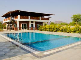 Tare Farm, khách sạn ở Umberpāda