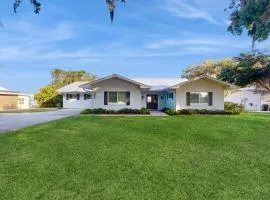 Renovated lakefront retreat with screened pool, private dock, patio, grill & W/D