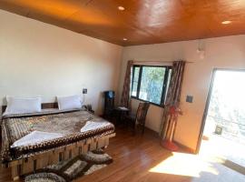 Into The Wild Viratkhai, hotel di Lakhwār