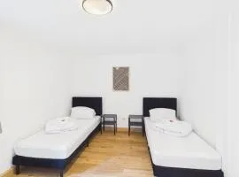 CROWN LIVING Basic Studios Fußach - Studios mit Küche, kostenloser Parkplatz, WLAN, Self Check-in, ideal für Feriengäste und Geschäftsreisende