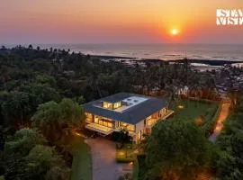 StayVista at Sapphire Shores Beachfront Villa with Lawn, Pool