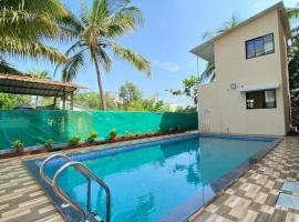 Beach Walk Luxury Resort with pool, Hotel in Alībāg
