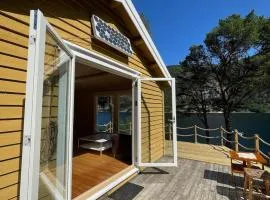 Cabin with boat close to the sea, Hitra municipality
