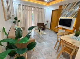 BMF Tropical Homestay، فندق في Calampanan