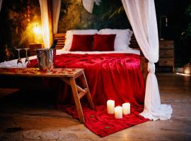 L'Evasion romantique en Amazonie, SPA, 5 min centre ville, Écran cinéma, day use, Lit baldaquin, hotel di Évreux