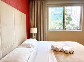 Quartos confortáveis e silenciosos em Botafogo - 5 min metrô com Ar Condicionado e Wi-Fi