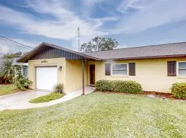 Dog-friendly canal-front home near Lake Jackson with water views, grill, firepit