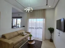 Studio une chambre sur le front de mer avec piscine partagée