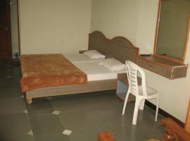 OYO Ambika Loge, hotel em Belia