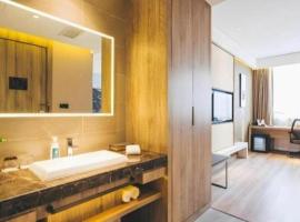 Vienna Hotel Shanghai Hongqiao Huaxin Road, hotel din Jiwang