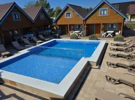 Two-story holiday homes with a pool