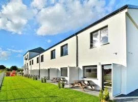 Two-story holiday homes with a summer pool