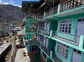 Sunset Inn tosh โรงแรมในTosh