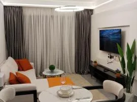 Luxe retreat 1Br near junction mall Pool,Gym,Fast WiFi