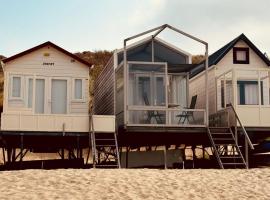 Welcome in - Slaapstrandhuisje I Strand dishoek 37, met zeezicht en terras, hotel di Koudekerke