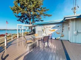 Waterfront home with panoramic bay views deck fireplace & beach access
